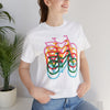 Pedal to Empower Unisex Tee