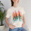 Pedal to Empower Unisex Tee